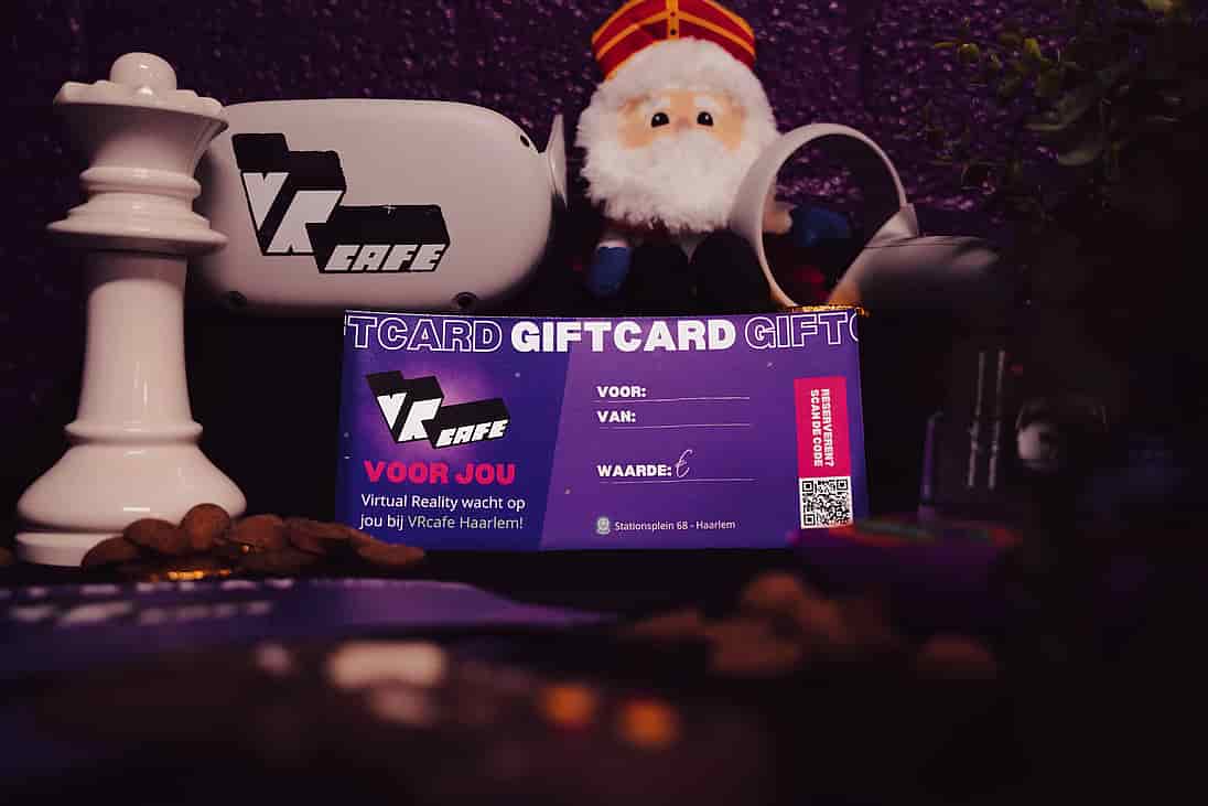 VRcafe Haarlem giftcard standing against a purple wall with Sinterklaas plushie and controllers nearby