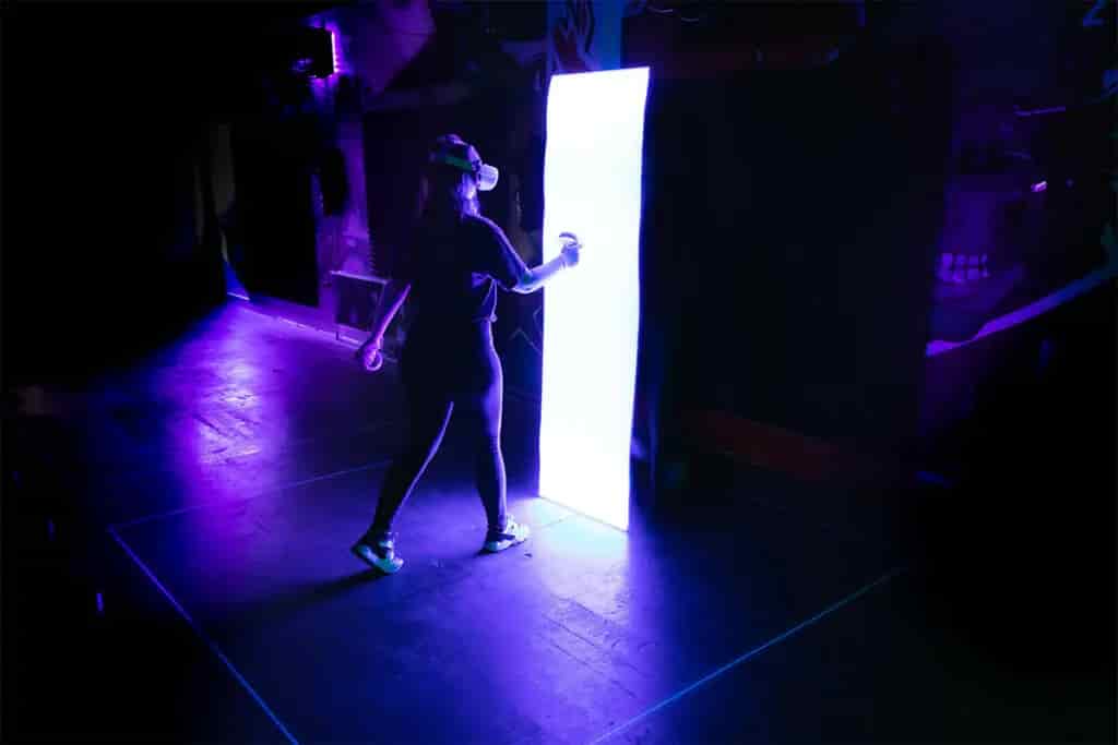 A person walking into a portal in virtual reality